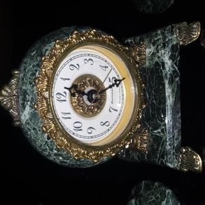 Antique set of clock with 2 candle holders